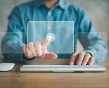 man using mouse and keyboard for streaming online, watching video on internet, live concert, show or tutorial