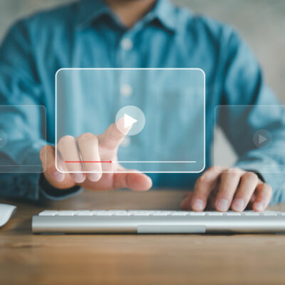 man using mouse and keyboard for streaming online, watching video on internet, live concert, show or tutorial