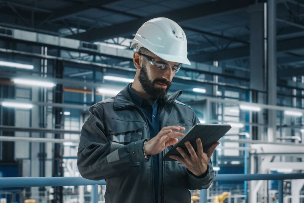 Warehouse employee using a tablet