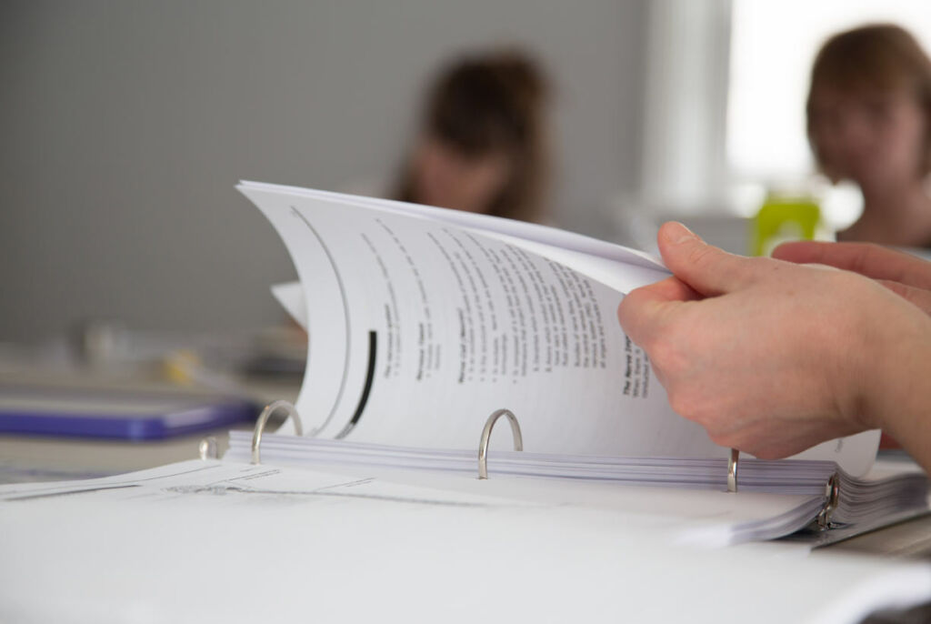 Person reading LX Design guides