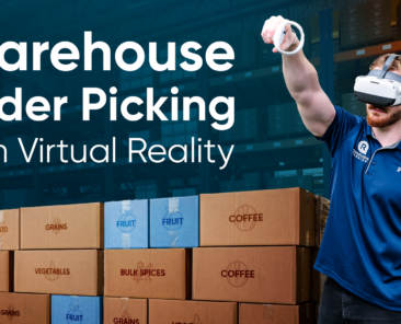 A new warehouse employee wearing a VR headset practices order selection, scanning a case of food product with a virtual finger scanner while pick details appear on a wrist-worn device.